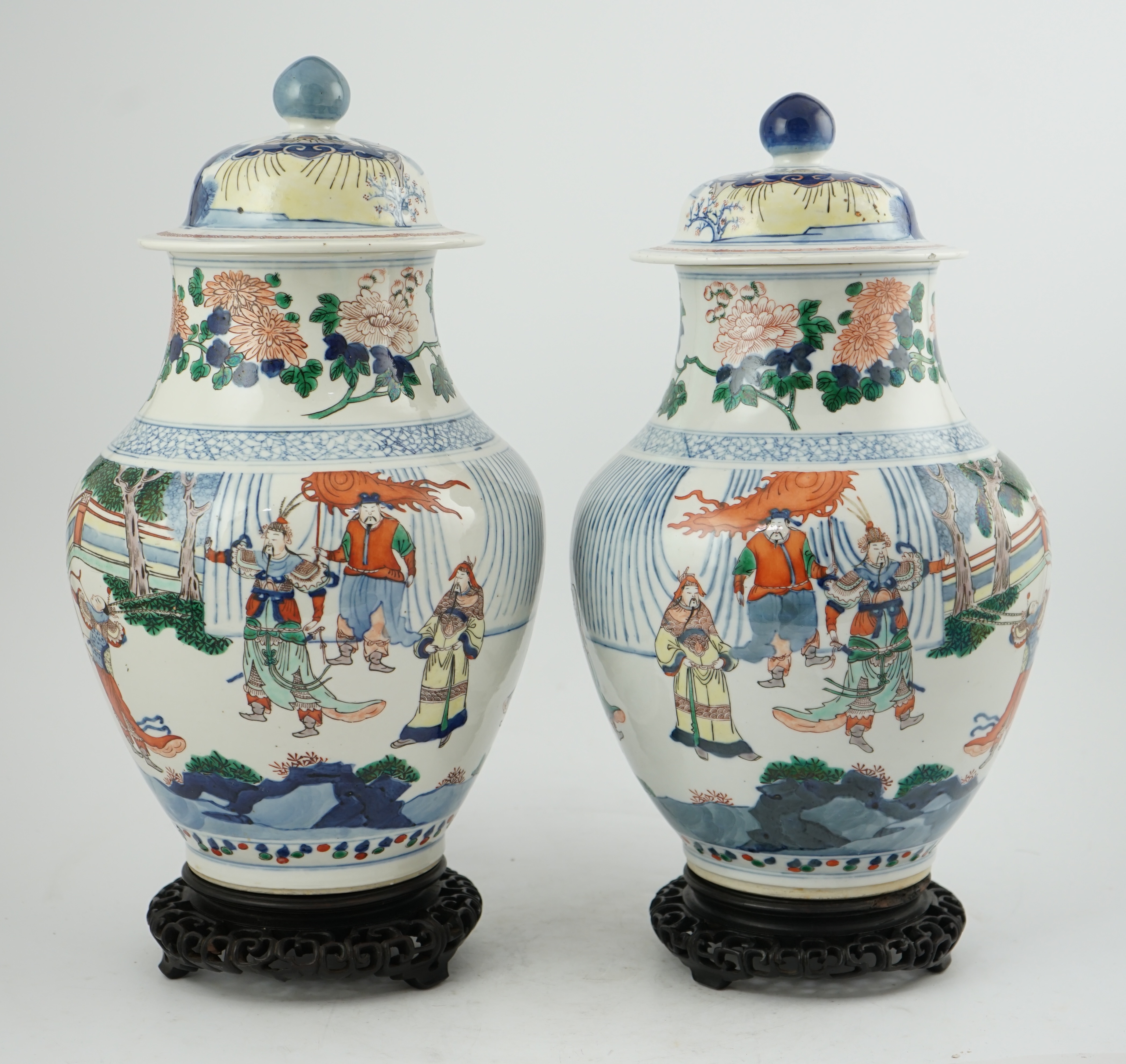 A pair of large Chinese wucai jars and covers, late 19th century